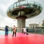 British Airways i360 and roller skating, people skating under the i360